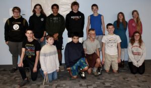 Group picture of teenage boys and girls at church event.